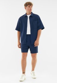 Johnny Urban MASON - Tepláky - navy