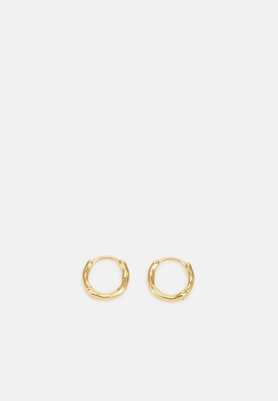 Gold hoop earrings with a textured design, featuring a twisted appearance. Each earring is circular and symmetrical.