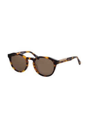 Runde Sonnenbrille mit dunklen Gläsern und braunem Schildpattgestell, leicht schräg gestellt, sodass sowohl Gläser als auch Bügel sichtbar sind.