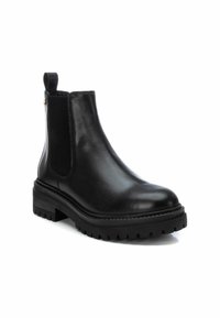 Carmela Botines con plataforma - black