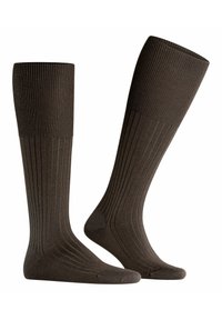 Calze marroni alte fino al ginocchio con texture a coste e punta rinforzata, caratterizzate da un colore uniforme e tessuto liscio e resistente.
