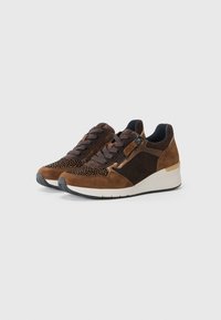 Brown sneakers with a mix of suede and textured material. Features laces, a side zipper, and a wedge heel with a white rubber sole.