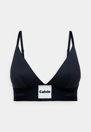 Calvin Klein svart bralette med trekantet form, justerbare stropper, myk stoff og et merket elastisk bånd nederst.