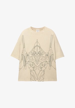 Krémszínű, oversized póló, amelynek elején egy fekete vonalas rajz található egy robotikus alakról. Rövid ujjak és kerek nyakkivágás jellemzi.