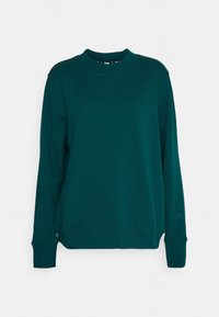 Teal sweatshirts met een ronde hals, lange mouwen en ribbelmanchetten. Gemaakt van zachte stof, heeft een iets losse pasvorm.