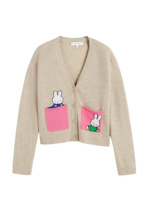 Beige vest met een V-hals, voorzien van roze zakken. Geborduurde konijntjes op de zakken, afgewerkt met een knoopsluiting en geribbelde manchetten.