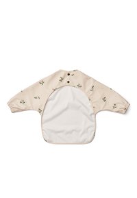 Langärmliger Kinderschutzanzug in hellbeige mit blumigen Mustern und elastischen Bündchen. Aus wasserdichtem Material mit einem weiten, offenen Rücken für einfaches An- und Ausziehen.