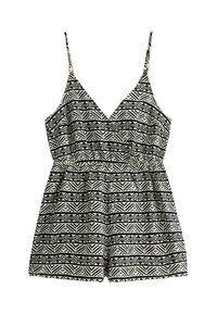 Jumpsuit à motifs noir et blanc avec décolleté en V, fines bretelles, taille élastique et bas évasé. Présente des designs géométriques sur l'ensemble.