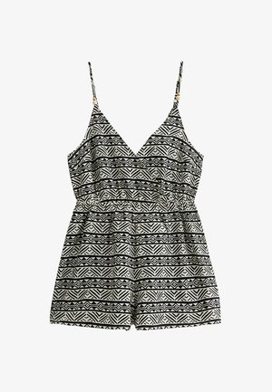 Black and white patterned jumpsuit with a V-neck, thin straps, elastic waist, and a flared bottom. Features geometric designs throughout.
