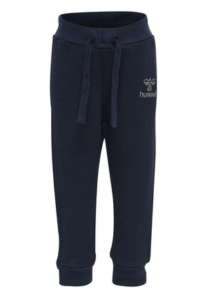 Marineblauwe sweatpants met wafelstructuur, voorzien van een elastische tailleband, verstelbare trekkoord en ribgebreide manchetten. Inclusief een logo op de voorkant.