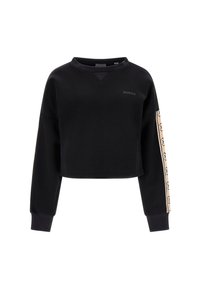 Czarna skrócona bluza z długim rękawem, beżowy pasek z powtarzającym się logo na jednym rękawie oraz małe logo "GUESS" na klatce piersiowej.