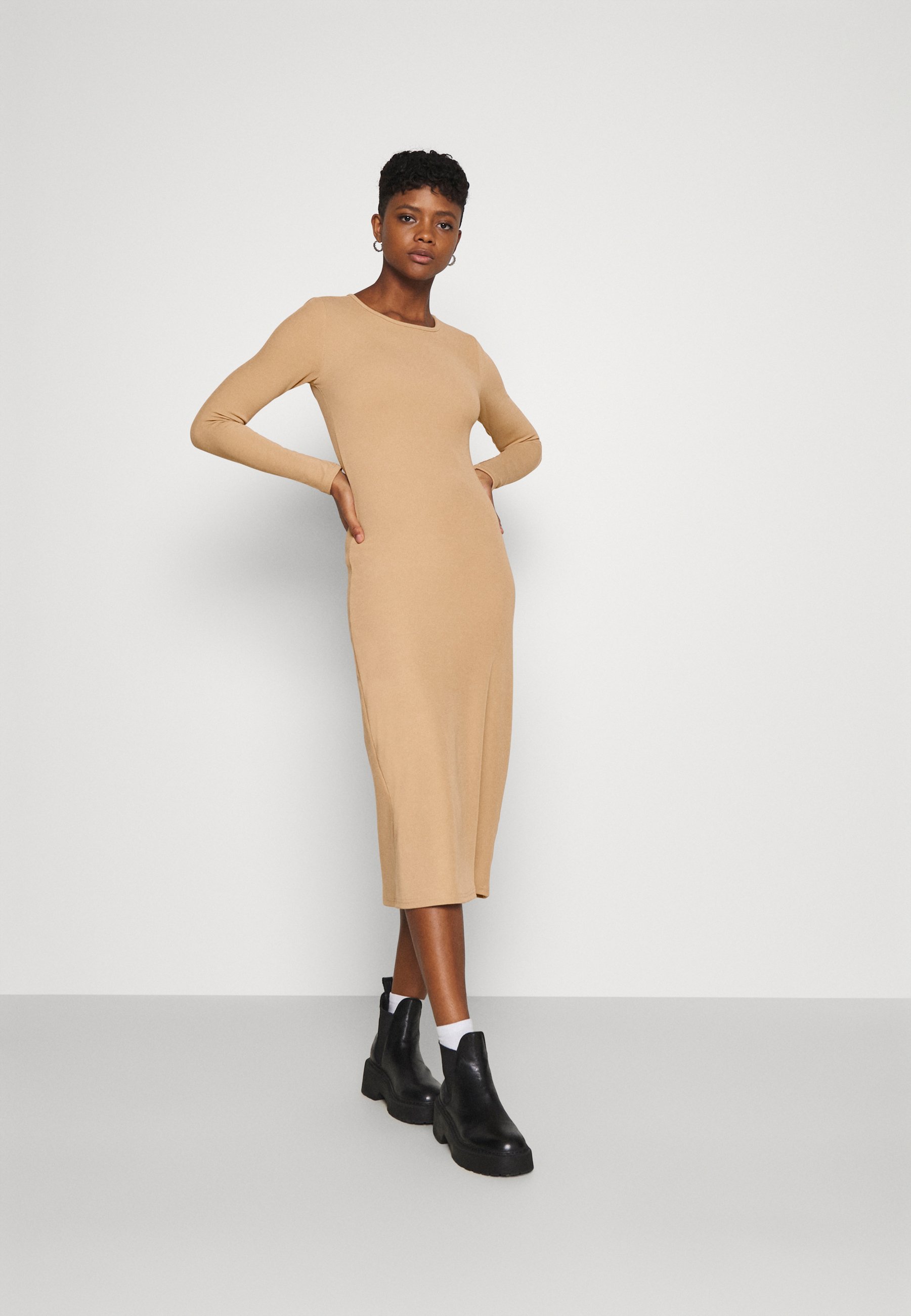 tan jumper dress