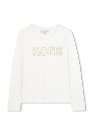 White long-sleeve t-shirt featuring the word "KORS" in gold studs. Soft cotton material with a round neckline and slim fit.