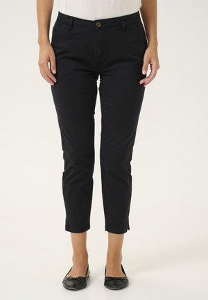 CUBRITA - Chinos - black
