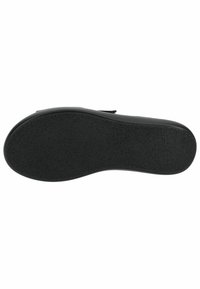 Suola di calzature nera in gomma, con una finitura texture per una migliore aderenza, dal design liscio e leggermente curvo, senza loghi visibili.