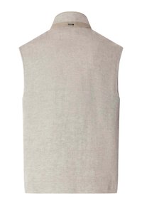 Veste en maille beige sans manches avec un col montant, un tissu texturé et une petite étiquette noire à l'arrière du col.