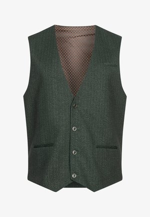 Zöld halszálkás mellény V nyakkal, öt gombos előlappal, két oldalsó zsebbel és mintás barna béléssel. Az anyag textúrált megjelenésű.