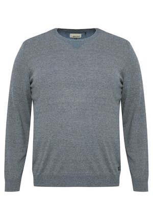 Maglione grigio a maniche lunghe in una morbida texture lavorata a maglia con design a V. Presenta polsini e orlo a coste e un piccolo etichetta con logo nella parte inferiore.
