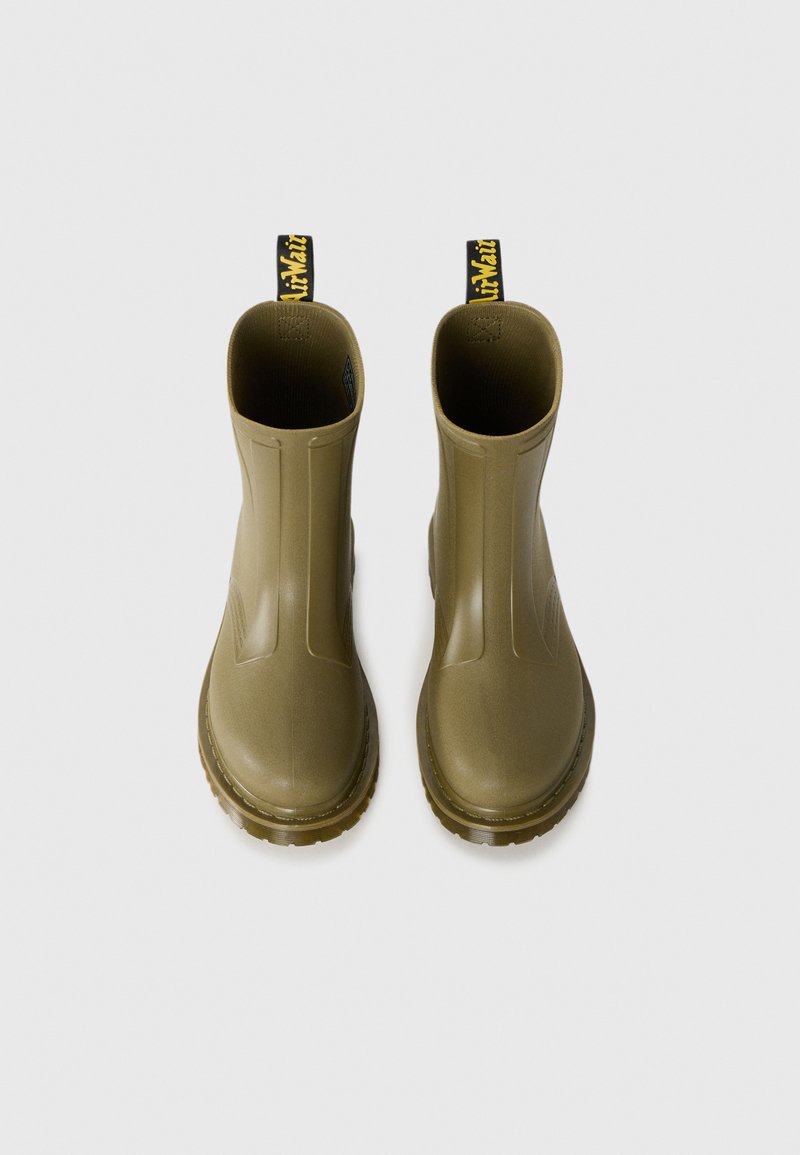 Green rubber ankle boots with a smooth finish, side grooves, and black pull tabs. Textured soles for grip. Simple, functional design.