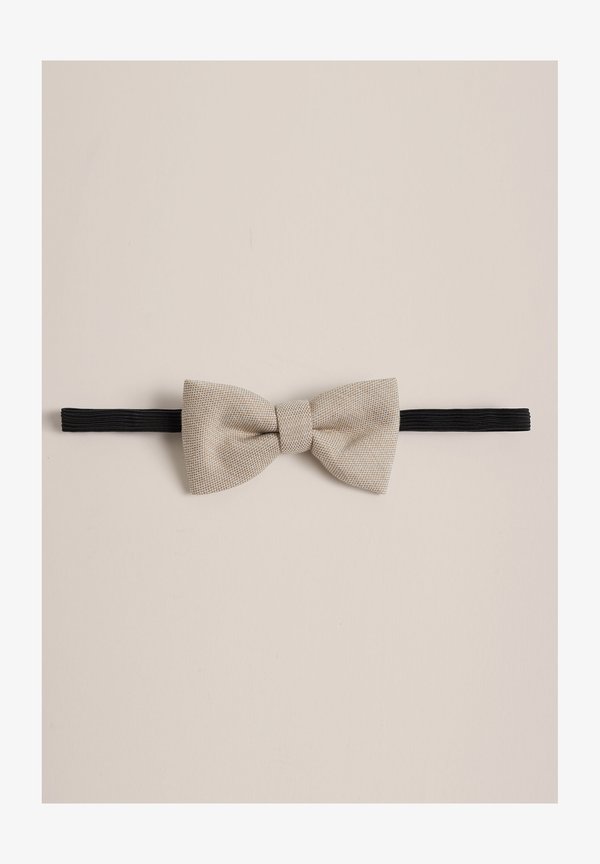Fliege – beige