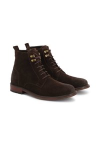 Brown suede ankle boots with metal eyelets, laces, and a textured finish. Flat sole with a slight heel, featuring pull tabs for ease of wear.