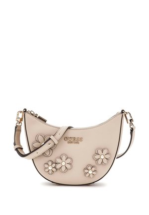 Sac à main en cuir beige avec des appliqués floraux et des accents en perles, forme incurvée, bandoulière ajustable, détail du logo doré et fermeture éclair.