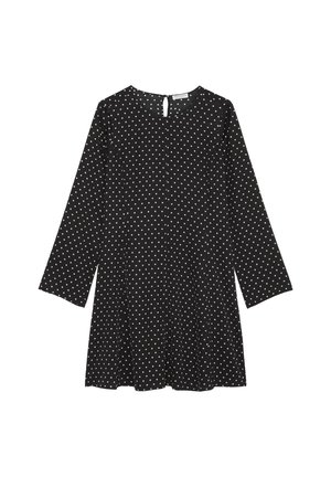 Zwarte jurk met lange mouwen, ronde hals en een gaatje op de rug. Beschikt over witte stippen, een A-lijn vorm en een soepele stofstructuur.