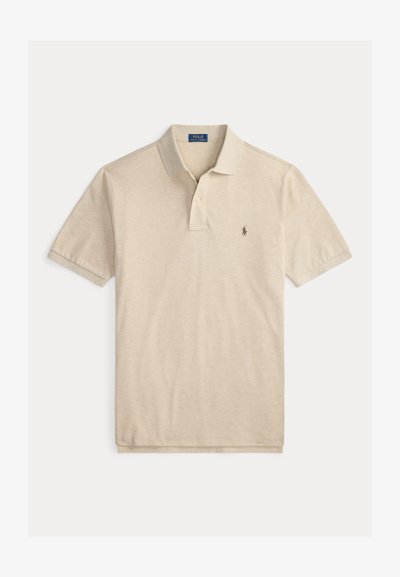 Beige lyhythihainen polopaita, jossa kaulukset ja kaksinappinen nappilista, vasemmassa rinnassa pieni brodeerattu hevosen logo.