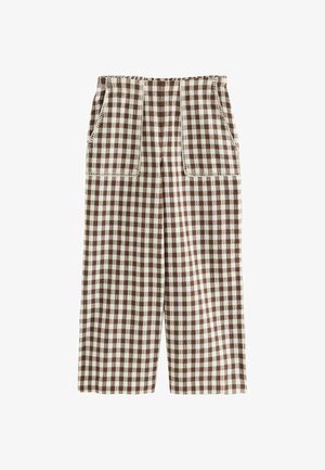 Braun-weiß karierte, weit geschnittene Hose mit zwei großen aufgesetzten Fronttaschen und elastischem Bund.