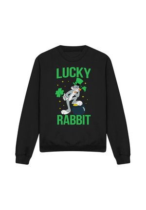 Black sweatshirt with cartoon rabbit wearing a green hat, holding a shamrock, standing on a pot of gold, words "Lucky Rabbit" in green.