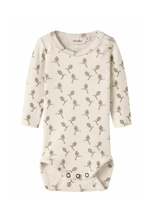 Crèmekleurige babybody met lange mouwen, kleine paarse bloemenprint en drukknopen in het kruis.