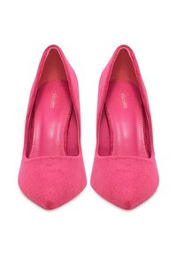 Pink suede pointed-toe heels feature a smooth inner lining, low-cut sides, and a sleek silhouette. Minimal hardware, matte finish.