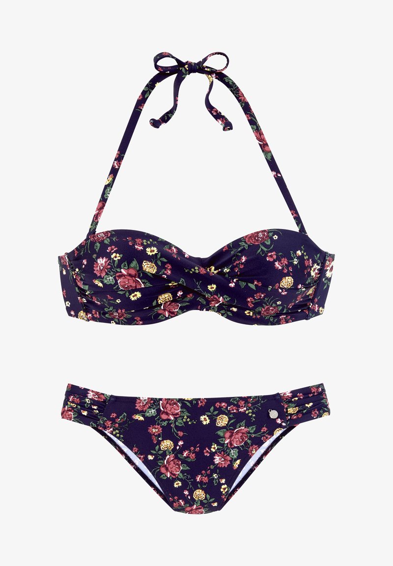 Ziedu bikini komplekts ar tumši zilu bāzi un sarkaniem un dzelteniem ziediem. Topam ir savīti dizains un regulējamas kakla siksniņas, savukārt apakšdaļai ir sānu akcenti.