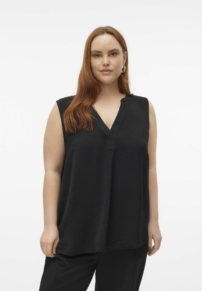 Haut sans manches noir en tissu texturé, présentant un décolleté en V et une coupe légèrement décontractée, offrant une silhouette lisse et fluide.
