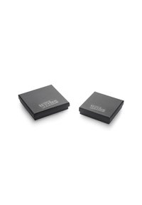 Two square black boxes with a matte finish, one slightly larger than the other, both featuring the text "TRUE REBELS!" in a lighter shade on the top.