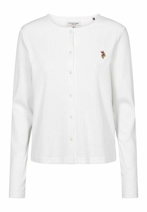 Balta briaunota kardiganas su ilgomis rankovėmis, mygtukų užsegimu ir mažais siuvinėjimo logotipo akcentais kairėje krūtinės pusėje. Švelni, tekstūruota medžiaga.