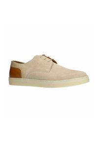 Beige lace-up shoe with a textured canvas upper and a brown leather accent at the heel. Flat rubber sole with contrasting stitching detail.