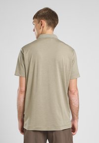 Jack Wolfskin TRAVEL  - Poloshirt - stone heather