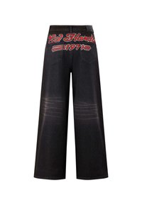 Černé džínové široké kalhoty s červeně vyšitým logem "Ed Hardy 1971" na zadní straně, s jemným vyblednutím a dvěma zadními kapsami.