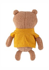 Stuffed bear with a soft, brown textured body, wearing a small, short-sleeved yellow shirt. Round ears and short limbs.
