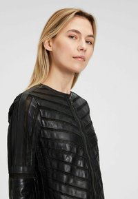 Mauritius GGSURI LELEV - Leren jas - black