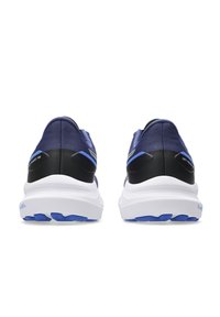 Scarpe da corsa blu con accentuazioni nere, parte superiore texturizzata e suola intermedia bianca. Caratterizzano un design a profilo basso e dettagli della suola a contrasto.