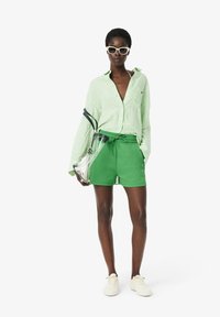 Lacoste Pantaloni sportivi - vert siw