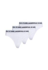 White cotton thongs in a pack of three with a black waistband featuring "KARL LAGERFELD" logo and silhouette detail.