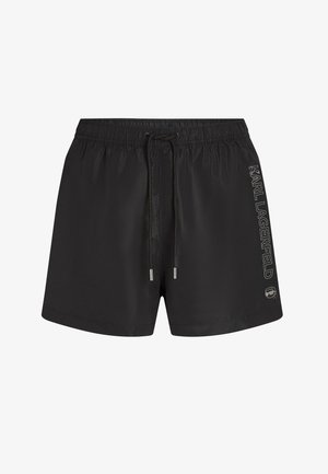 Fekete fürdőnadrág elasztikus derékpánttal, állítható húzózsinórral és ezüst logó díszítéssel az oldalon. Sima, könnyű anyag.