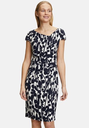 Kleid mit einem navyblauen Blumenmuster auf einem cremefarbenen Hintergrund, in taillierter Form, mit kurzen Ärmeln und einem gerafften Taillendetail.