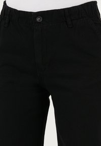 Pantalones - black