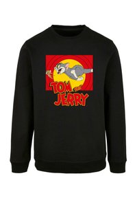 Fekete kapucnis pulóver színes "Tom és Jerry" grafikával. A dizájnban mesehősök láthatók piros és sárga háttér előtt.