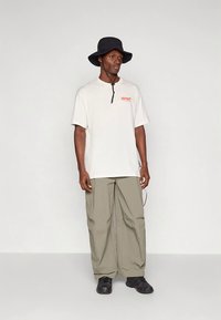 Peak Performance FWT ART TEE - Majica kratkih rukava s printom - offwhite