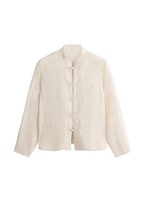 Bež lanena jakna s dugim rukavima, mandarinskim ovratnikom i pet tradicionalnih čvorastih gumba sprijeda.